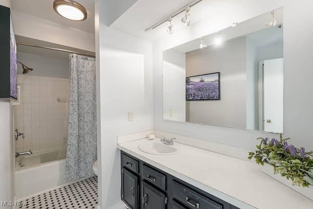 613-3 Fairington Oval, Aurora, OH 44202 - full bath featuring toilet, vanity, shower / tub combo, and track lighting