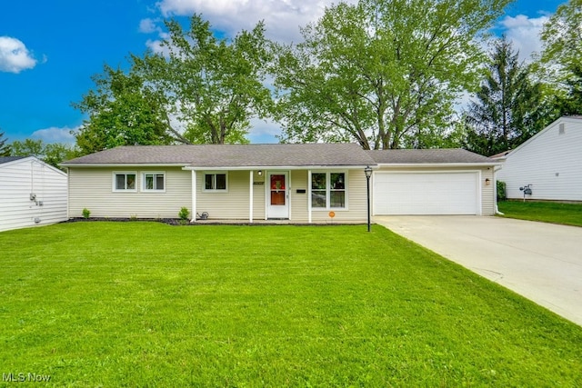 24560 Eldridge Blvd, Bedford Heights, OH 44146 - single story home with an attached garage, driveway, and a front yard
