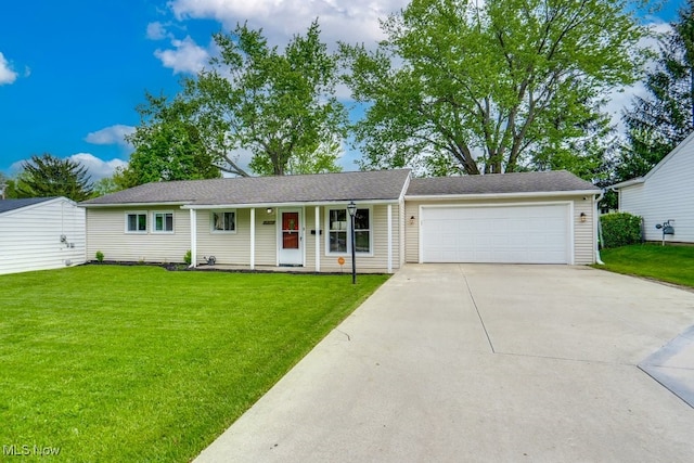 24560 Eldridge Blvd, Bedford Heights, OH 44146 - ranch-style house with a garage, driveway, a front lawn, and a porch