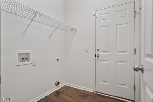 clothes washing area with hookup for an electric dryer, washer hookup, dark wood-style floors, and baseboards