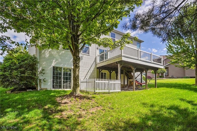 back of property with a deck