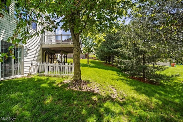 view of yard with a deck