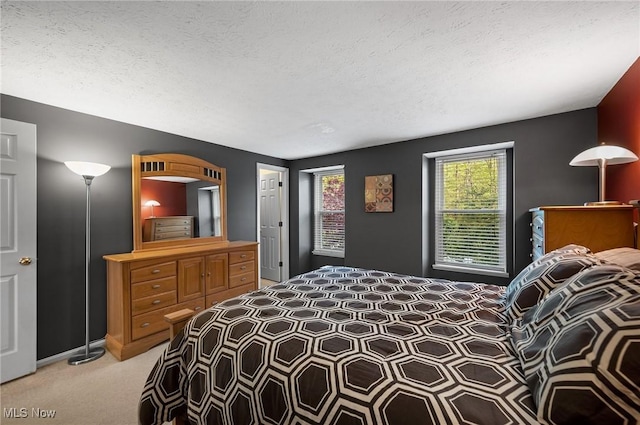 16538 S White Oaks Dr, Strongsville, OH 44136 - bedroom with light colored carpet and a textured ceiling