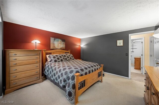 16538 S White Oaks Dr, Strongsville, OH 44136 - bedroom with carpet, a textured ceiling, and baseboards