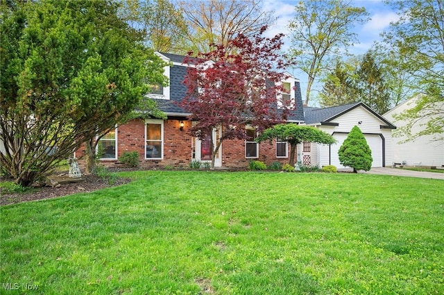 16538 S White Oaks Dr, Strongsville, OH 44136 - obstructed view of property with driveway, an attached garage, a front lawn, and brick siding