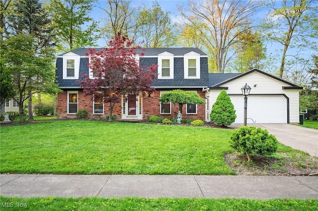 16538 S White Oaks Dr, Strongsville, OH 44136 - colonial inspired home with a shingled roof, an attached garage, driveway, and a front lawn