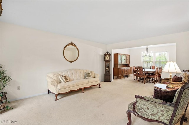 16538 S White Oaks Dr, Strongsville, OH 44136 - carpeted living area with a chandelier and baseboards