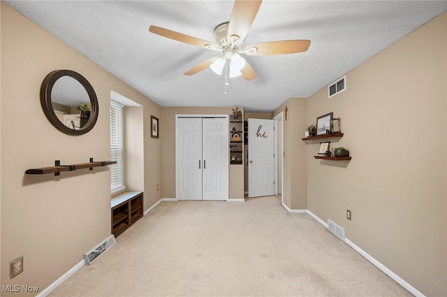 16538 S White Oaks Dr, Strongsville, OH 44136 - unfurnished bedroom featuring baseboards, carpet, a closet, and ceiling fan