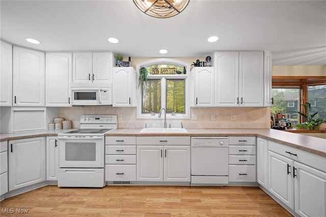 16538 S White Oaks Dr, Strongsville, OH 44136 - kitchen featuring white appliances, a sink, white cabinetry, and recessed lighting
