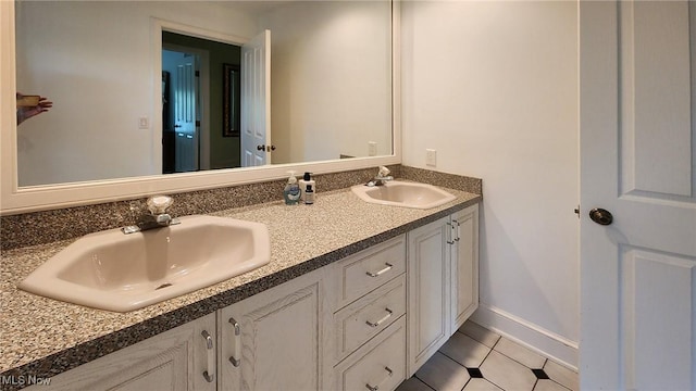 5 W Mather Ln Unit 5, Bratenahl, OH 44108 - full bath featuring double vanity, tile patterned floors, and baseboards