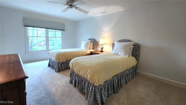 5 W Mather Ln Unit 5, Bratenahl, OH 44108 - carpeted bedroom with a ceiling fan and baseboards
