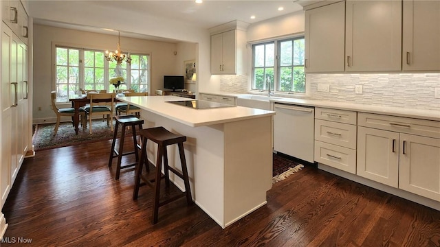 5 W Mather Ln Unit 5, Bratenahl, OH 44108 - kitchen featuring dishwasher, plenty of natural light, a sink, dark wood-style flooring, and recessed lighting