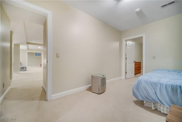 5 W Mather Ln Unit 5, Bratenahl, OH 44108 - carpeted bedroom featuring baseboards and vaulted ceiling