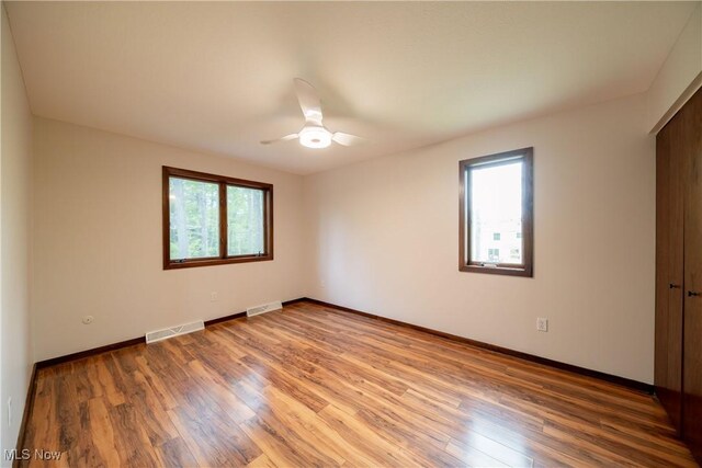 1537 Plantation Dr, Hudson, OH 44236 - unfurnished room with healthy amount of natural light, light wood-type flooring, and baseboards