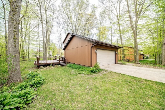 1537 Plantation Dr, Hudson, OH 44236 - view of side of home with a deck, a yard, and a garage