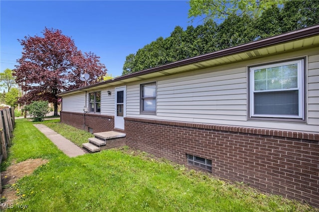 241 W Good Ave, Wadsworth, OH 44281 - view of home's exterior featuring brick siding