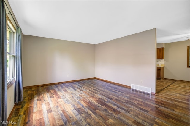 241 W Good Ave, Wadsworth, OH 44281 - spare room featuring dark wood finished floors and baseboards