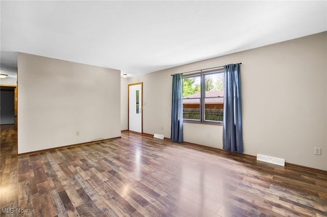 241 W Good Ave, Wadsworth, OH 44281 - unfurnished living room with wood finished floors