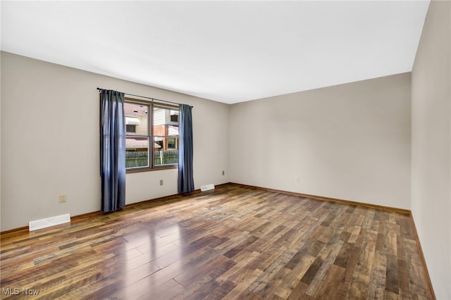 241 W Good Ave, Wadsworth, OH 44281 - unfurnished room featuring wood finished floors and baseboards