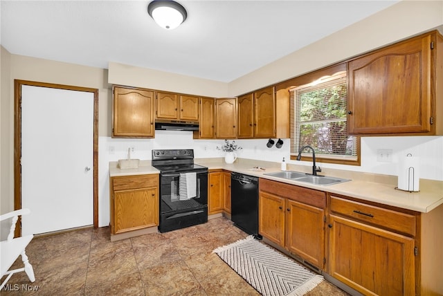 241 W Good Ave, Wadsworth, OH 44281 - kitchen featuring black appliances, a sink, under cabinet range hood, light countertops, and brown cabinets