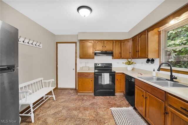 241 W Good Ave, Wadsworth, OH 44281 - kitchen featuring black appliances, a sink, and light countertops