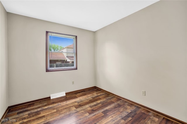 241 W Good Ave, Wadsworth, OH 44281 - empty room with dark wood-style floors and baseboards