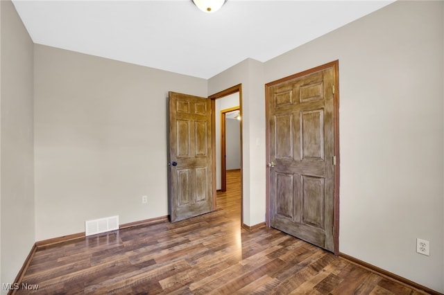241 W Good Ave, Wadsworth, OH 44281 - unfurnished bedroom featuring wood finished floors and baseboards