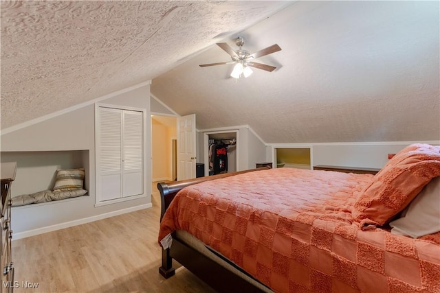 274 2nd St, Lake Milton, OH 44429 - bedroom featuring light wood-style flooring, a textured ceiling, lofted ceiling, ceiling fan, and baseboards