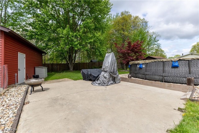 274 2nd St, Lake Milton, OH 44429 - fenced backyard with a patio