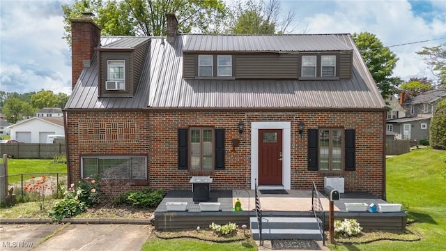 1106 W Virginia Ave, Parkersburg, WV 26104 - view of front of property with brick siding, a chimney, and metal roof