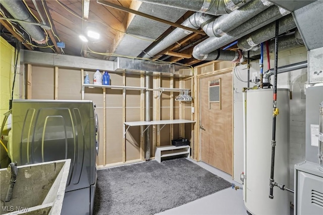 5610 Charles Ave, Parma, OH 44129 - unfinished below grade area with water heater and washer / clothes dryer