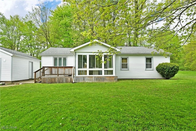 3138 Mccleary Jacoby Rd, Cortland, OH 44410 - rear view of property with a deck and a yard