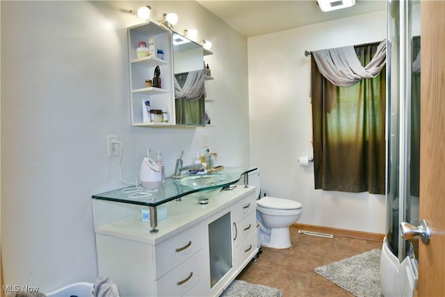 3138 Mccleary Jacoby Rd, Cortland, OH 44410 - bathroom featuring toilet, tile patterned flooring, vanity, and baseboards