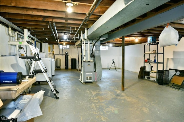 3138 Mccleary Jacoby Rd, Cortland, OH 44410 - below grade area featuring heating unit and washer / dryer