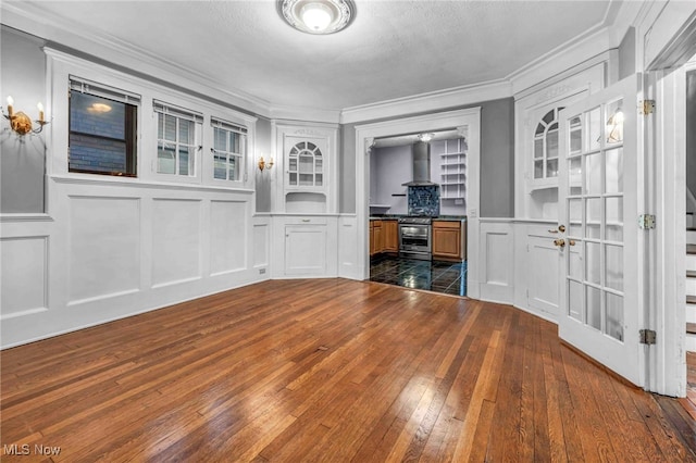 103 N Portage Path, Akron, OH 44303 - unfurnished office with dark wood-style floors, crown molding, a decorative wall, and built in shelves