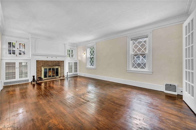 103 N Portage Path, Akron, OH 44303 - unfurnished living room with wood-type flooring, ornamental molding, a fireplace, and baseboards