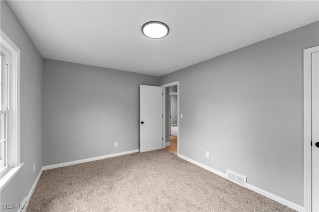 2394 Reimer Rd, Wadsworth, OH 44281 - unfurnished bedroom featuring carpet floors and baseboards