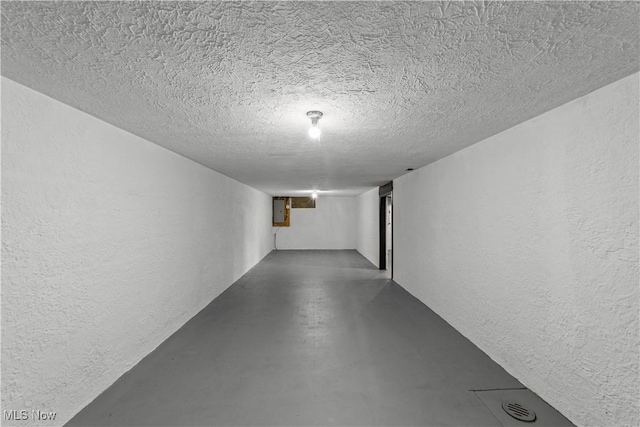 2394 Reimer Rd, Wadsworth, OH 44281 - finished basement with electric panel, a textured wall, and a textured ceiling
