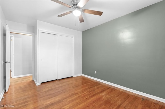 718 Starlight Dr, Seven Hills, OH 44131 - unfurnished bedroom with light wood-type flooring, baseboards, and a closet