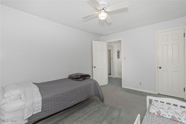 bedroom with carpet, baseboards, and ceiling fan