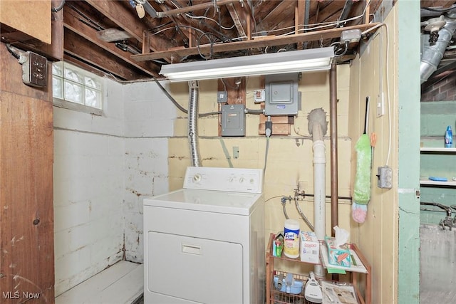 clothes washing area featuring washer / dryer