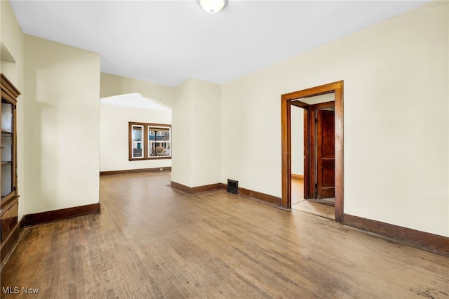 2142 W 95th St, Cleveland, OH 44102 - unfurnished room featuring wood finished floors and baseboards
