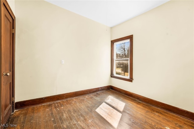 2142 W 95th St, Cleveland, OH 44102 - empty room featuring baseboards and hardwood / wood-style floors