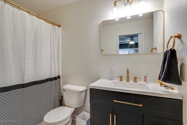 3585 Gerome Ct, Cleveland, OH 44105 - bathroom with vanity, ceiling fan, and a shower with curtain