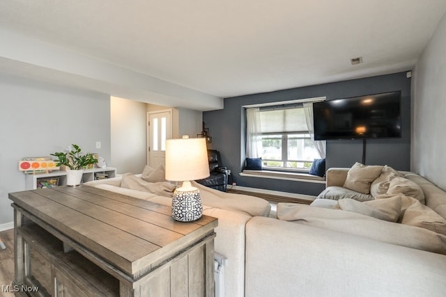 3585 Gerome Ct, Cleveland, OH 44105 - living area with wood finished floors and baseboards