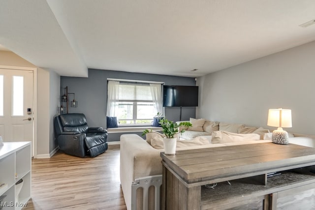 3585 Gerome Ct, Cleveland, OH 44105 - living area featuring light wood-style floors and baseboards