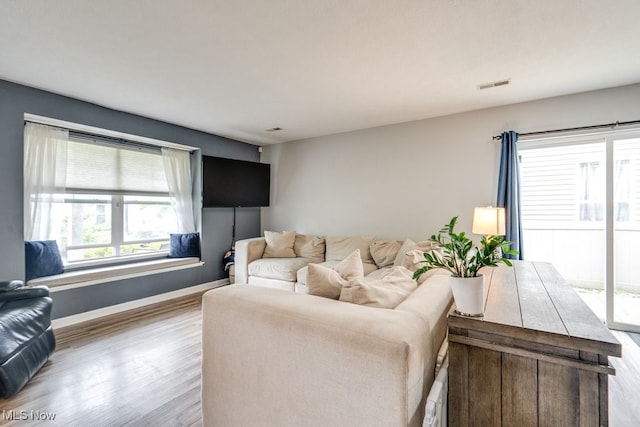 3585 Gerome Ct, Cleveland, OH 44105 - living room with wood finished floors and baseboards