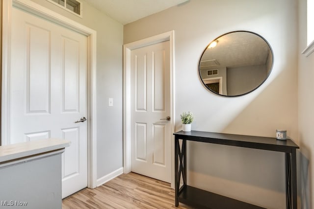 3585 Gerome Ct, Cleveland, OH 44105 - hallway with light wood-style flooring and baseboards