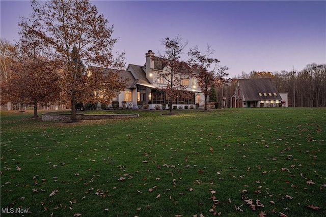 425 Woodside Ave, Jefferson, OH 44047 - yard at dusk featuring a yard