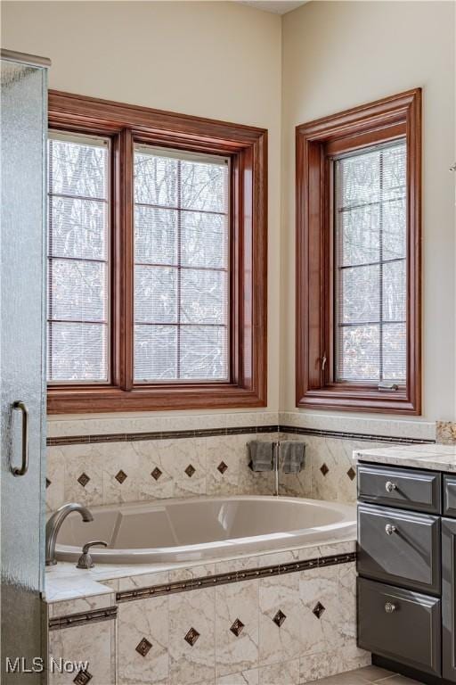 425 Woodside Ave, Jefferson, OH 44047 - full bathroom with healthy amount of natural light and a bath